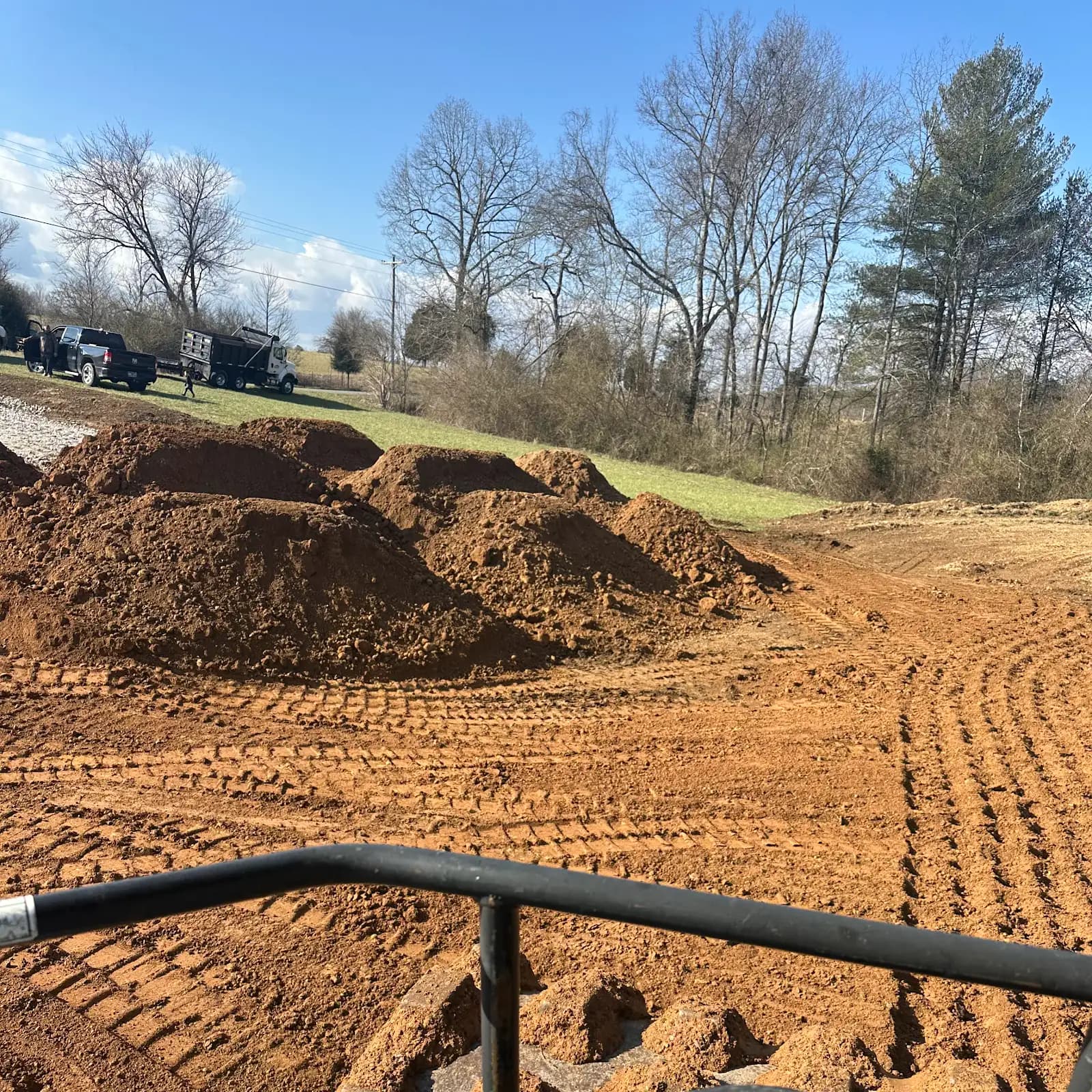 Quality Excavating excavator working on a wooded East Tennessee site